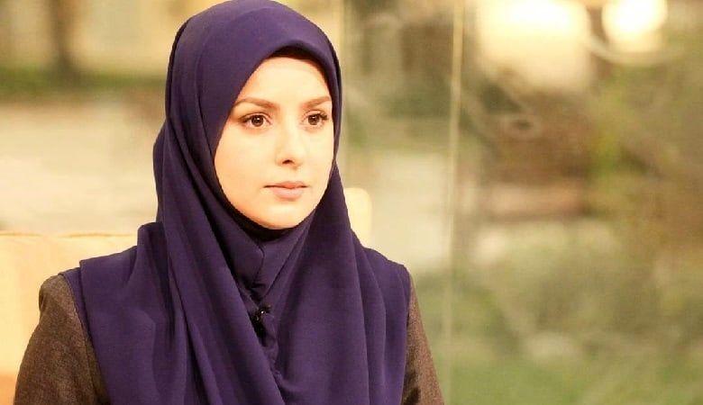 عکسی از گوینده معروف تلویزیون و همسرش 